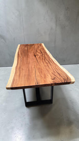 Luxury live edge dining table made from solid Suar timber.