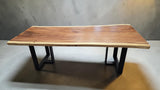 Premium Monkey Pod dining table with powder-coated steel legs.