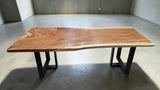 Handcrafted 2300 x 1000mm live edge Suar wood dining table with black steel legs.