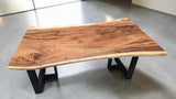 Premium Monkey Pod timber tabletop showing flowing natural grain.
