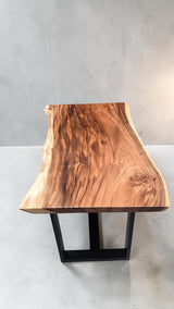 End view highlighting the natural live edge profile.