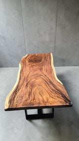 Side profile of handcrafted Suar dining table showing natural live edge and premium timber grain
