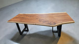 Handcrafted live edge Suar wood dining table measuring 2100 x 1000mm with natural timber grain and optional black steel or solid timber legs.