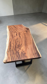 Handcrafted live edge Suar wood dining table measuring 2100 x 1000mm with natural timber grain and optional black steel or solid timber legs.