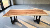 Modern Australian handcrafted timber dining table with natural grain.
