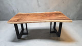 Handcrafted 1800 x 950mm live edge Suar wood dining table with black steel legs.