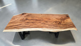 Handcrafted 2300mm live edge Suar dining table with black steel legs.